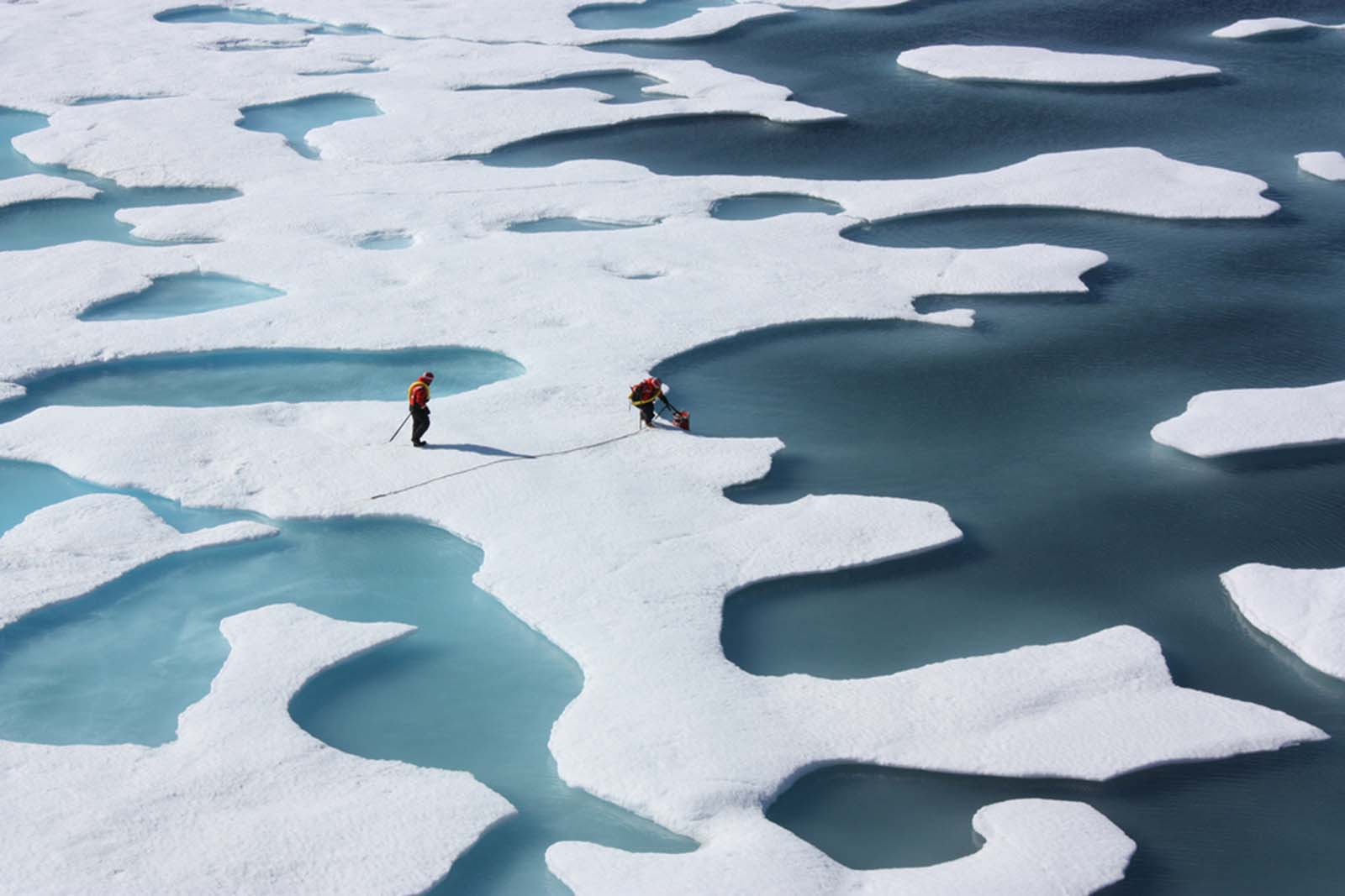 people walking on snow and ice