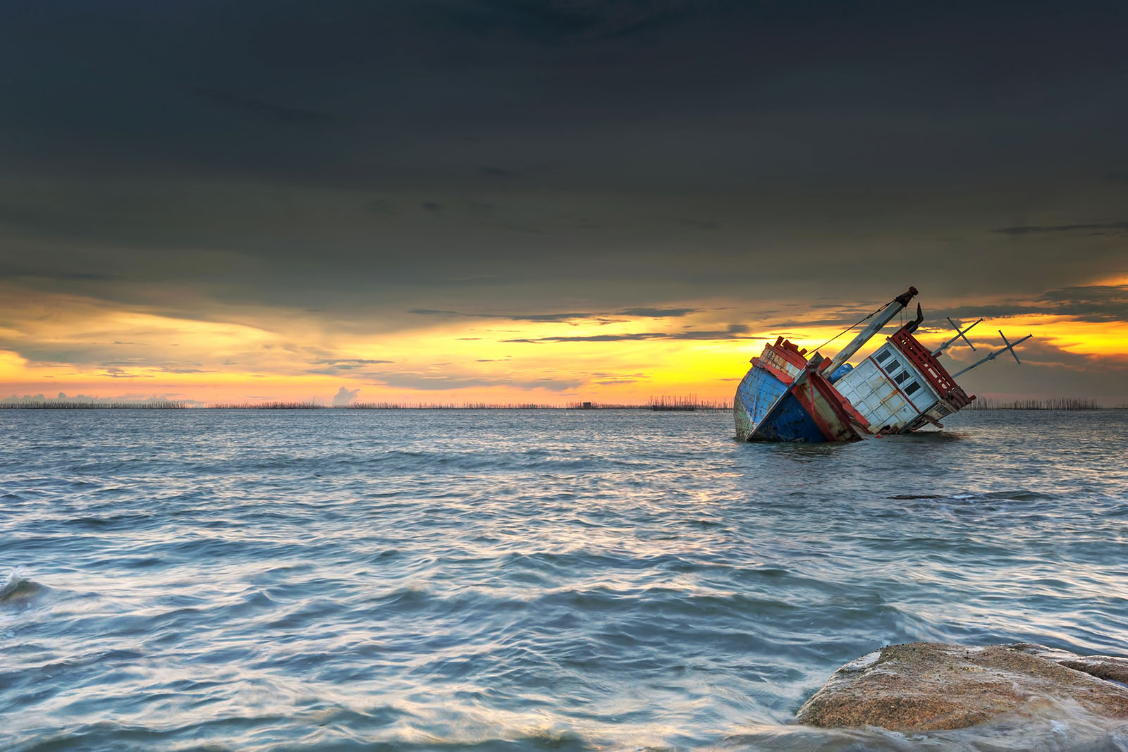 ship wrecked at sunset in Chonburi ,Thailand