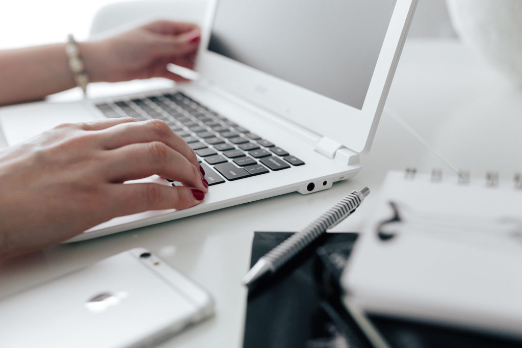 person using a laptop computer