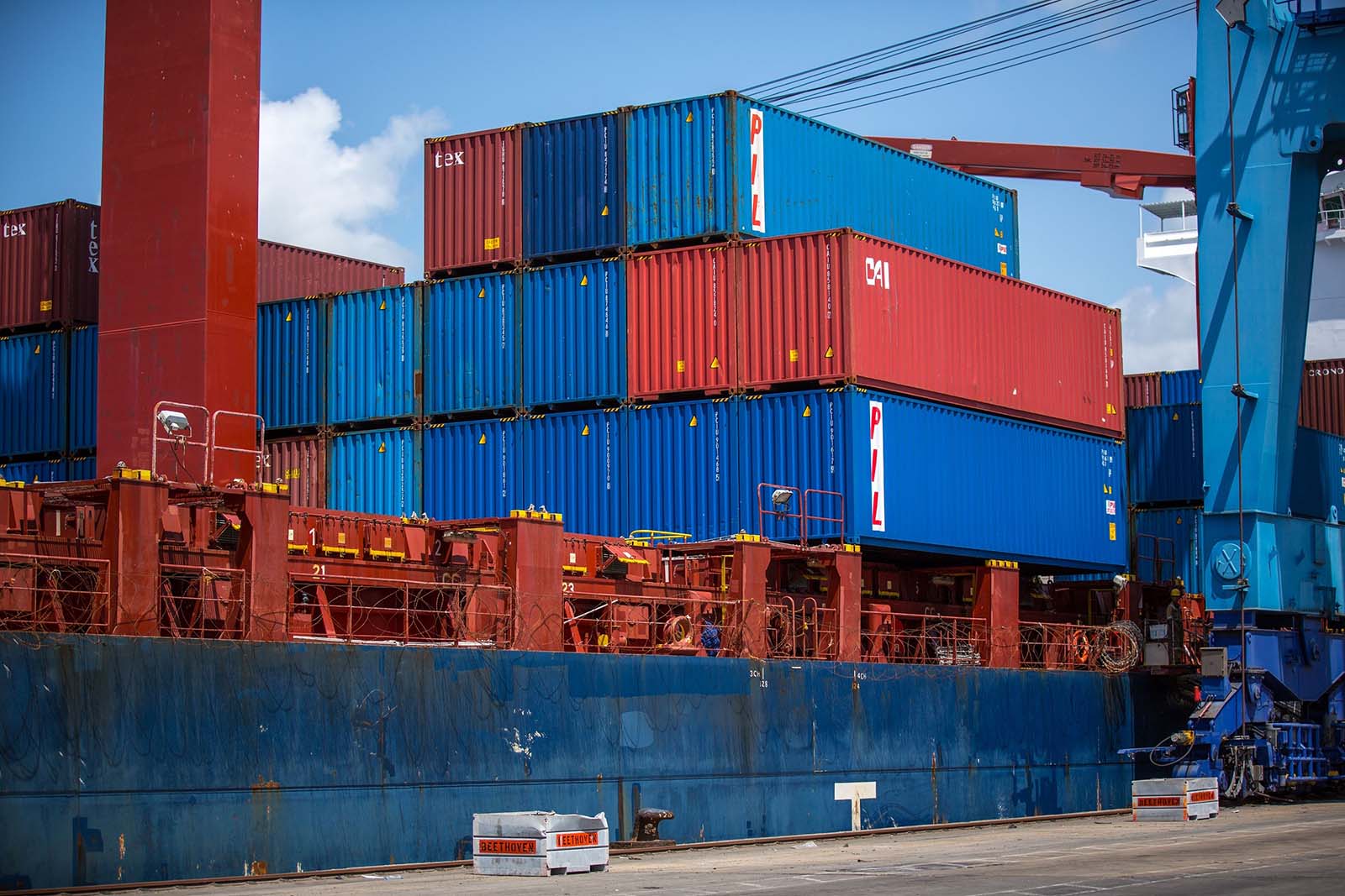 Shipping containers on a ship that is docked