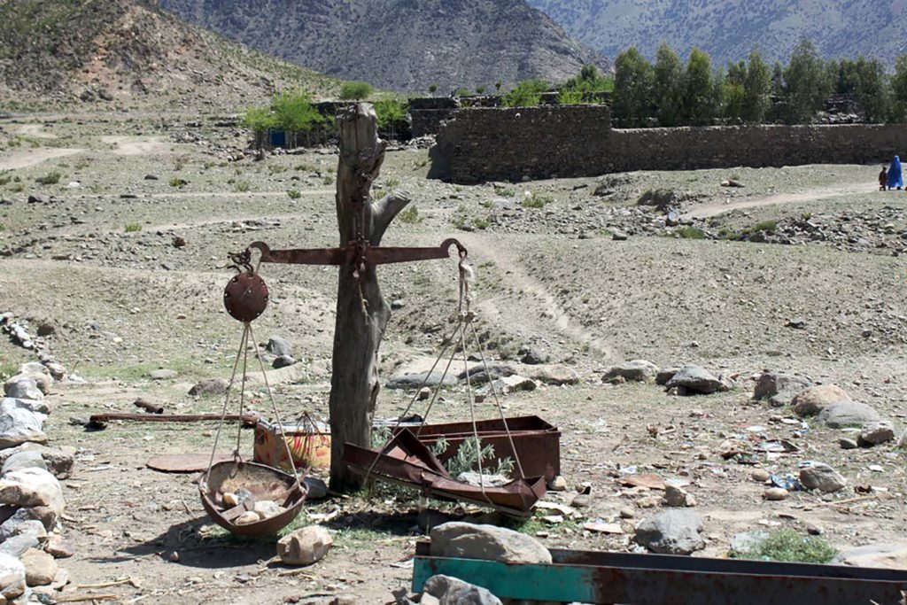 Scales of justice on a roadside in Afghanistan