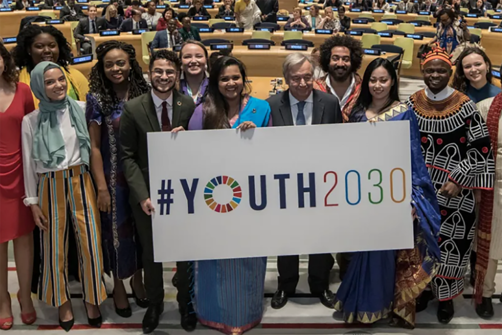 Young people holding a sign "#Youth 2030"