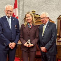 Peter Boehm, Ann Fitz-Gerald and Joe Clark in the Senate Chambers.