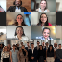 Participants of the Policy Challenge - online in boxes and in person standing in a group